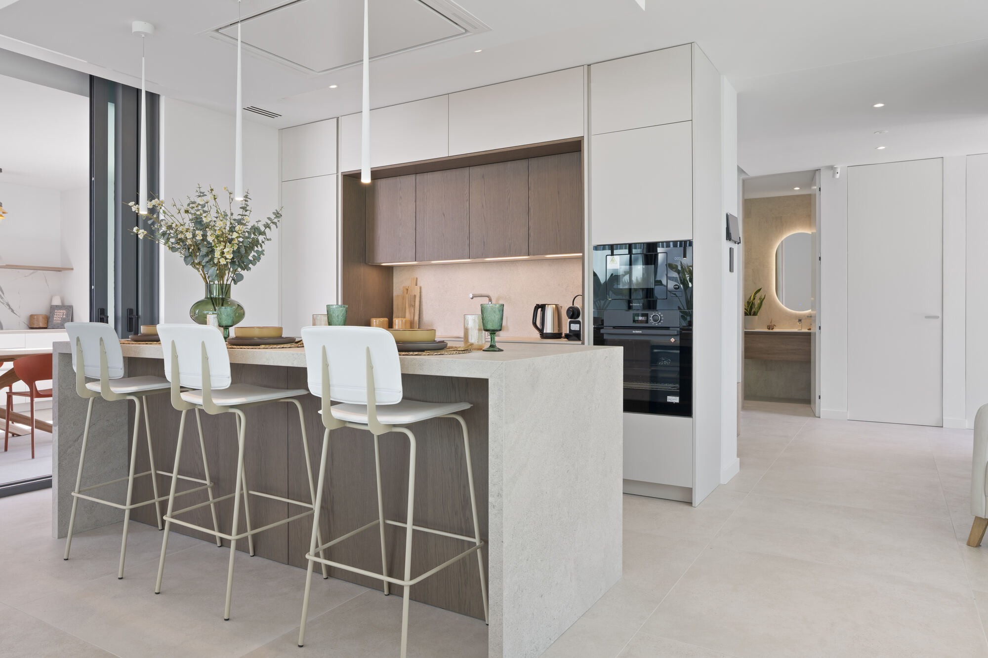 Villa 26 8 Stone waterfall-edge kitchen island at Villa 26