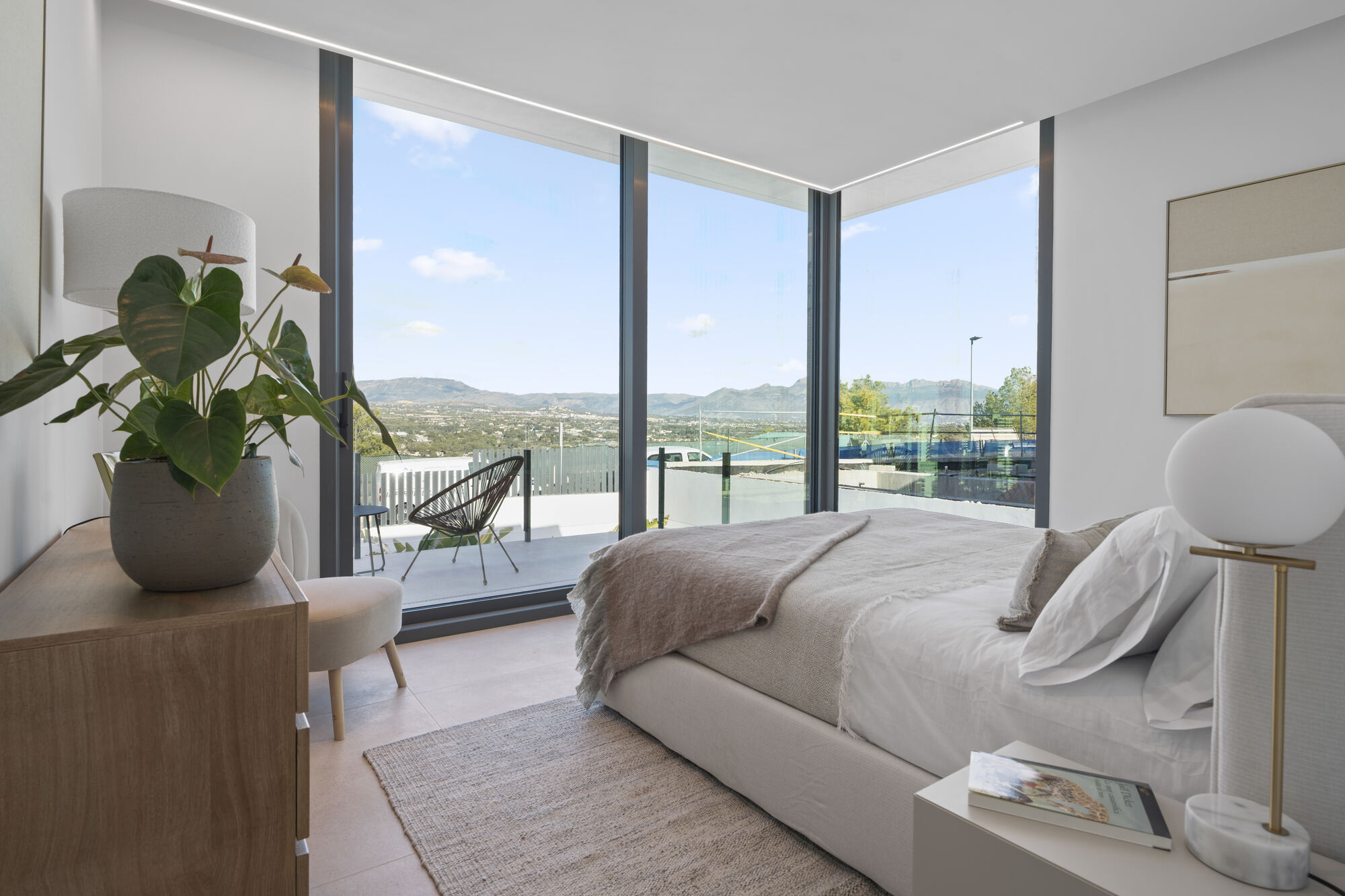 Bedroom with City & Mountain Views