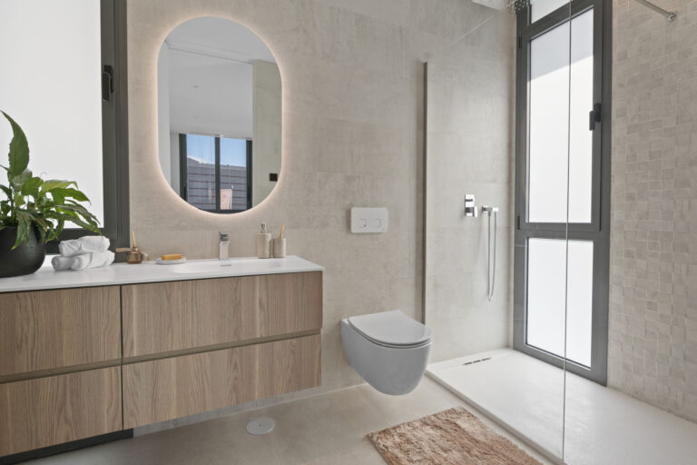 Best Luxury New-Build Developments on the Costa Blanca (2026) 10 En-suite bathroom with walk-in shower and wooden vanity at Villa 26